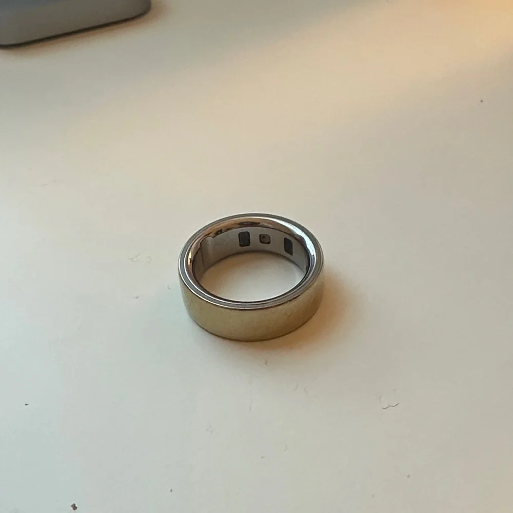 Gold Oura ring health tracker